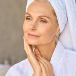 mature lady with beautiful skin in a bathrobe