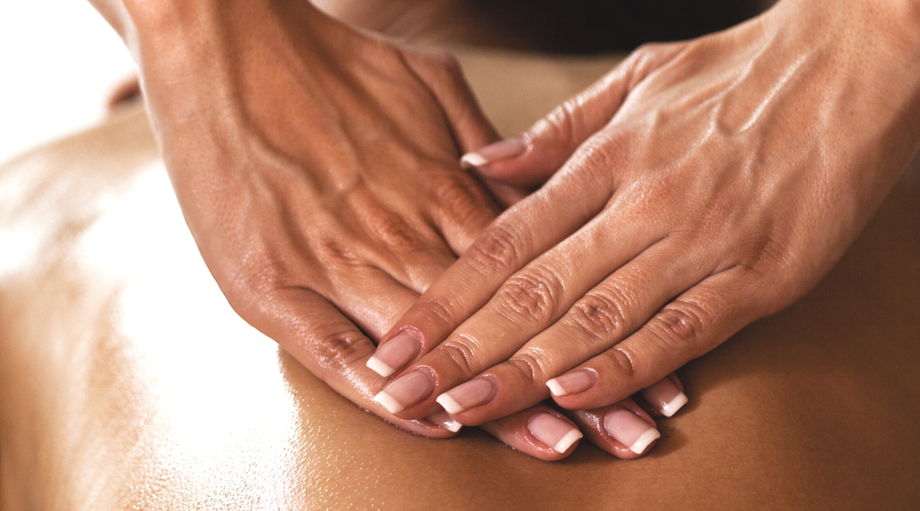 Someone receiving a relaxing massage and facial treatment